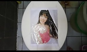 pissing on printed pic #2