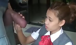 Asian schoolgirl opens yon there swell up gigantic cock
