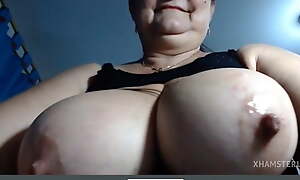 Granny Valerie shows big boobs licking big nipples