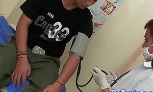 Oriental twinks ass fondled by doctor