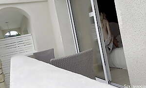Hot spanish girl was secretly filmed in her hotel room through the window while she was drawing some nude photes.