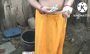 Anita yadav bathing outside with hot