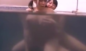 Japanese Lesbian Seduces at the Bathhouse