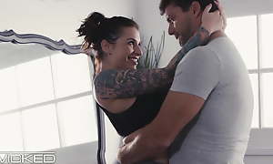 Busty, Tattooed Babe Cheats On Costs In the matter of Coworker
